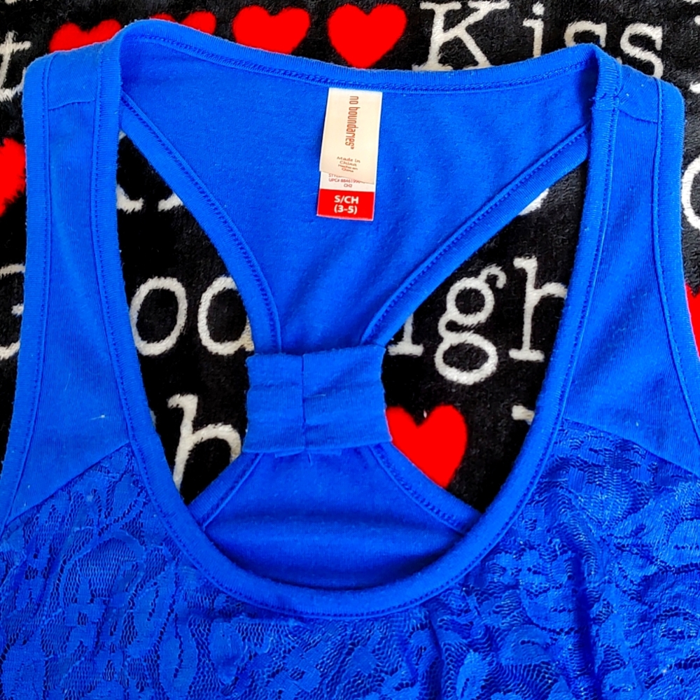 Super soft tank top. In blue with layers of soft lace up front.